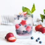 summer strawberry star-cube drink in a glass with garnish