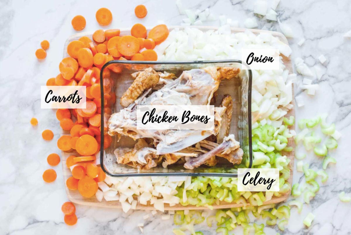 Overhead image of the four recipe ingredients scattered around on top of a wood cutting board.